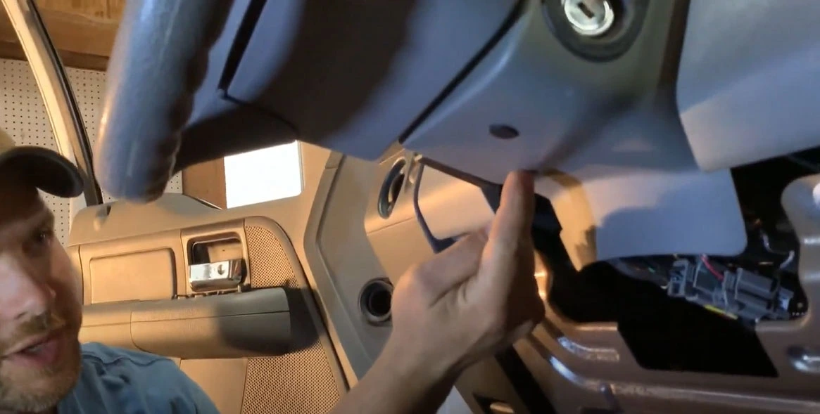 Step to remove the panel under the steering wheel